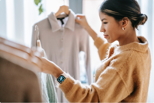 Woman browsing through clothes